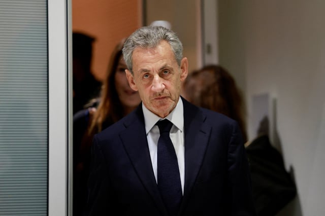 Former French President Nicolas Sarkozy leaves after the verdict in his trial with other defendants on charges of corruption and illegal financing of an election campaign related to alleged Libyan funding of his successful 2007 presidential bid, at the courthouse in Paris, France, September 25, 2025. REUTERS/Stephanie Lecocq