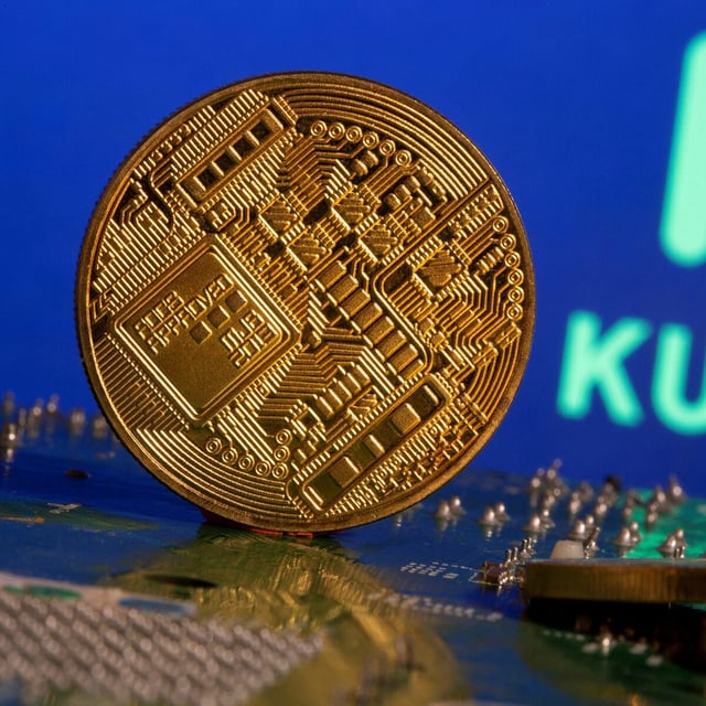 FILE PHOTO: Representations of cryptocurrency is seen in front of a Kucoin logo in this illustration taken on February 9, 2021. REUTERS/Dado Ruvic/Illustration/File Photo