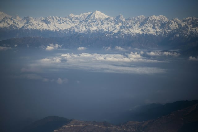 This picture taken from a commercial aircraft shows an aerial view of the Himalayan mountain range near Kathmandu