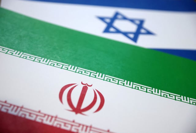 Israel and Iran flags are seen in this illustration taken June 18, 2025. REUTERS/Dado Ruvic/Illustration