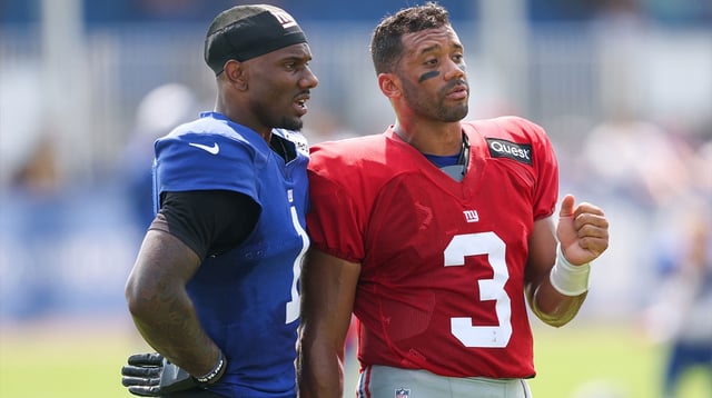 Aug 4, 2025; East Rutherford, NJ, USA; New York Giants wide receiver Malik Nabers (1) talks with quarterback Russell Wilson (3) during training camp at Quest Diagnostics Training Center. Mandatory Credit: Vincent Carchietta-Imagn Images