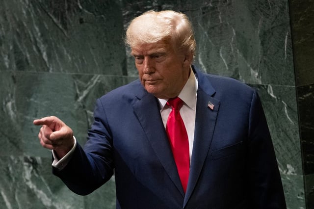 US President Donald Trump points to attendees after delivering remarks to the United Nations General Assembly at the UN headquarters in New York City on September 23, 2025. (Photo by Brendan Smialowski / AFP) (Photo by BRENDAN SMIALOWSKI/AFP via Getty Images)