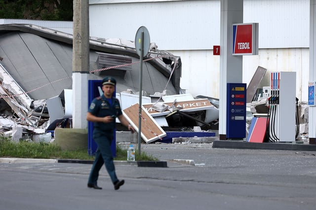 BELGOROD, RUSSIA - JUNE 10 : Emergency services operate at the area where at least one person was killed and three others were injured in a Ukrainian drone strike on a gas station in Belgorod, Russia, Governor Vyacheslav Gladkov reported on Tuesday, June 10, 2025. The body of a woman was retrieved from under the rubble and the injured individuals were transported to hospitals. (Photo by Emil Leegunov/Anadolu via Getty Images)