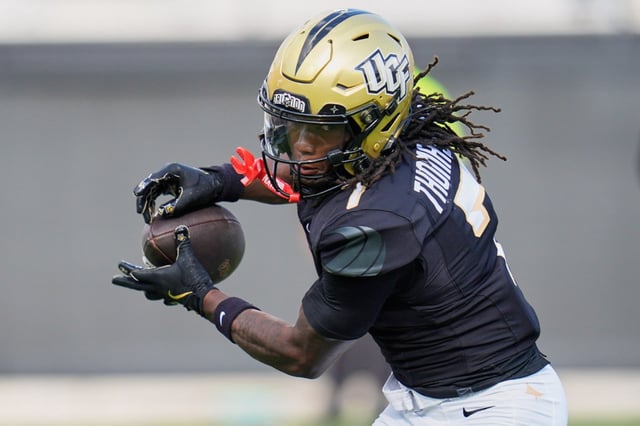 Central Florida wide receiver Duane Thomas Jr. makes a reception during an NCAA college football game against North Carolina, Saturday, Sept. 20, 2025, in Orlando, Fla. (AP Photo/John Raoux)
