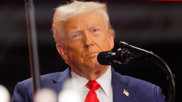 President Donald Trump attends a memorial service for conservative commentator Charlie Kirk at State Farm Stadium in Glendale, Arizona on September 21, 2025.