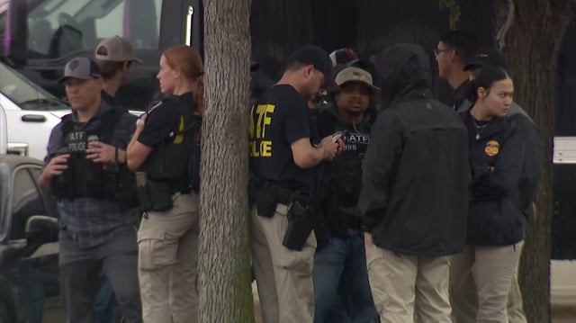 ATF agents investigate a shooting outside a Dallas ICE facility, Wednesday, Sept. 24, 2025.