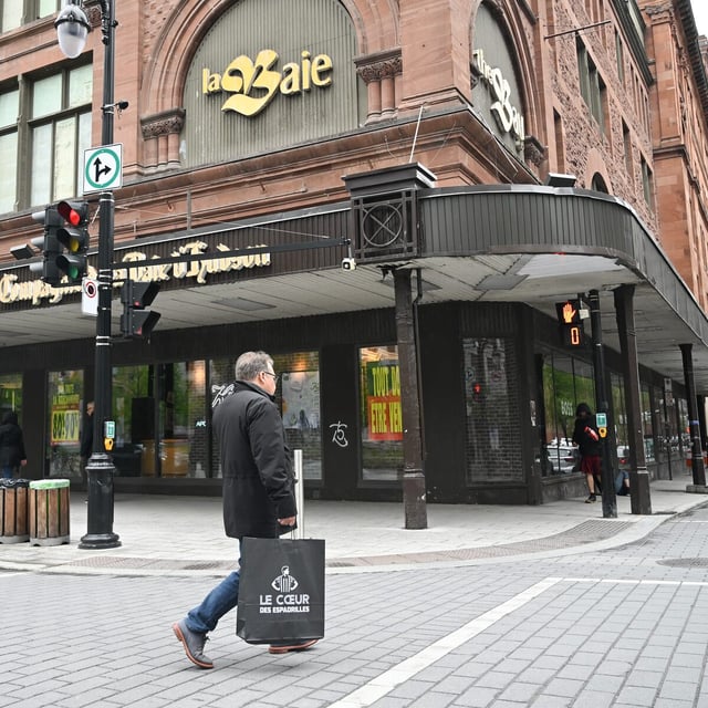 A person walks by a Hudson’s Bay store in Montreal, Sunday, June 1, 2025. THE CANADIAN PRESS/Graham Hughes