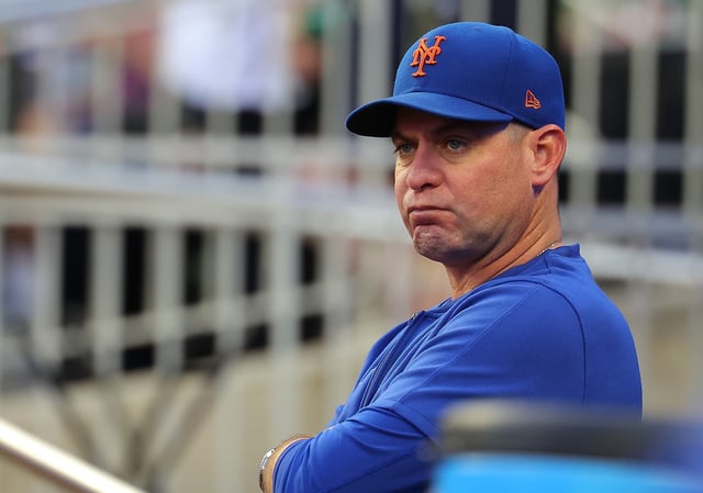 ATLANTA, GEORGIA - SEPTEMBER 24:  Manager Carlos Mendoza #64 of the New York Mets looks on prior to the game against the Atlanta Braves at Truist Park on September 24, 2024 in Atlanta, Georgia. (Photo by Kevin C. Cox/Getty Images)