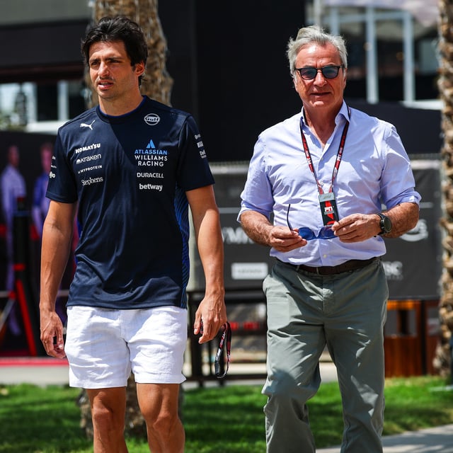 Carlos Sainz of Spain and Williams walks in the paddock with his father Carlos Sainz Sr during qualifying ahead of the F1 Grand Prix of Bahrain at Bahrain International Circuit on April 12, 2025 in Bahrain, Bahrain.