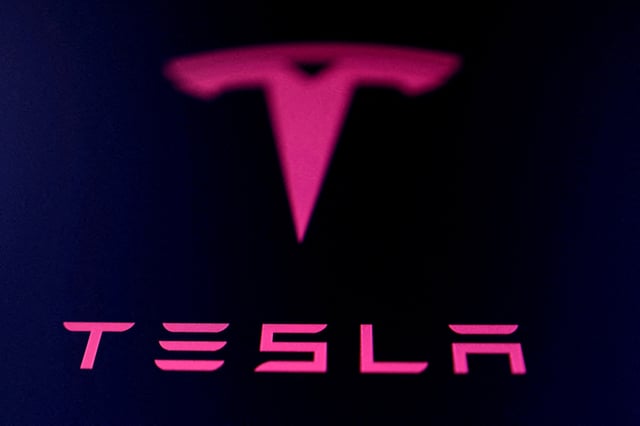 Tesla logo is seen in this illustration taken July 23, 2025. REUTERS/Dado Ruvic/Illustration//File Photo