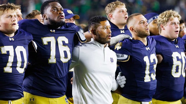 Notre Dame head coach Marcus Freeman celebrates with his players after winning a NCAA football game 56-30 against Purdue at Notre Dame Stadium on Saturday, Sept. 20, 2025, in South Bend.