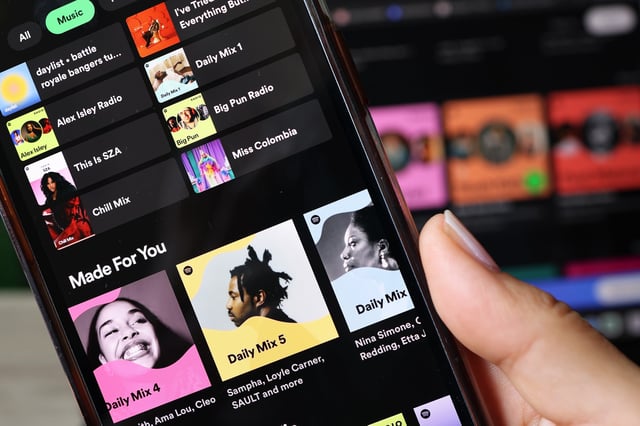 NEW YORK, NEW YORK - JUNE 04: In this photo illustration, the Spotify music app is seen on a phone on June 04, 2024 in New York City. Spotify made an announcement that it will be raising the price of its Spotify Premium Individual plan by $1, from $10.99 to $11.99 per month and the Premium Family plan by $3, from $16.99 to $19.99 per month. (Photo Illustration by Michael M. Santiago/Getty Images)