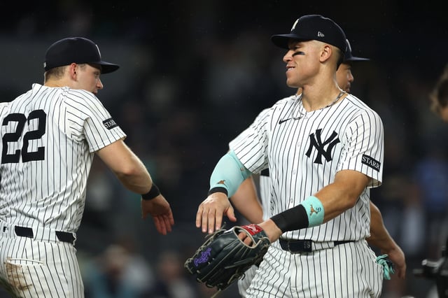 NEW YORK, NEW YORK - SEPTEMBER 24: Aaron Judge #99 and Ben Rice #22 of the New York Yankees celebrate after the ninth inning against the Chicago White Sox at Yankee Stadium on September 24, 2025 in the Bronx borough of New York City. The Yankees won 8-1. (Photo by Ishika Samant/Getty Images)