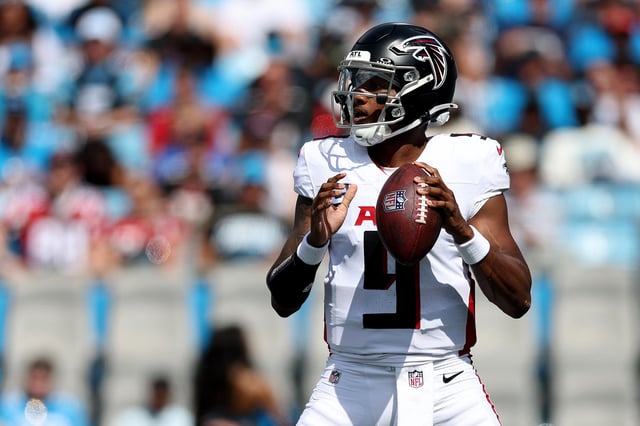 CHARLOTTE, NORTH CAROLINA - SEPTEMBER 21: Michael Penix Jr. #9 of the Atlanta Falcons looks to pass during the third quarter against the Carolina Panthers at Bank of America Stadium on September 21, 2025 in Charlotte, North Carolina. (Photo by David Jensen/Getty Images)