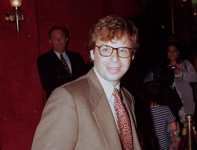 FILE - In this May 1994 file photo, actor Rick Moranis is shown at an unknown location.  A law enforcement official tells the Associated Press that Moranis was sucker punched by an unknown assailant while walking Thursday, Oct. 1, 2020, on a sidewalk near New York’s Central Park.   Moranis took himself to the hospital and later went to a police station to report the incident, according to the official, who was not authorized to speak publicly about the incident and did so on condition of anonymity. (AP Photo/File)