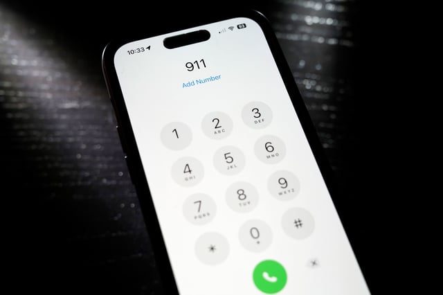Emergency 911 number is dialed on a mobile phone on April 18, 2024, in St. Louis. Louisiana and Mississippi are experiencing widespread 911 outages.