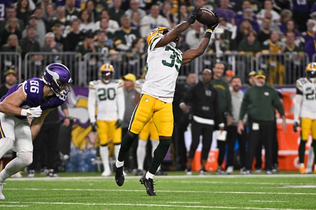 Corey Ballentine #35, formerly of the Green Bay Packers, intercepts a pass against the Minnesota Vikings during the first quarter of a game at U.S. Bank Stadium on December 31, 2023 in Minneapolis, Minnesota.