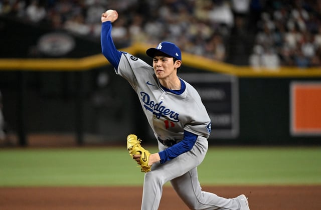 Dodgers relief pitcher Roki Sasaki throws to the plate during the seventh inning against the Arizona Diamondbacks on Wednesday, Sept. 24, 2025, in Phoenix. (Photo by Norm Hall/Getty Images)