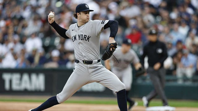 Aug 30, 2025; Chicago, Illinois, USA; New York Yankees starting pitcher Cam Schlittler (31) delivers a pitch against the Chicago White Sox during the first inning at Rate Field. Mandatory Credit: Kamil Krzaczynski-Imagn Images