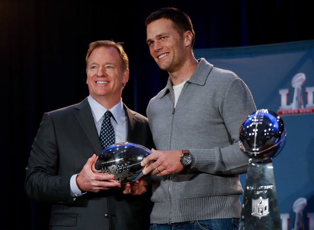 HOUSTON, TX - FEBRUARY 06:  NFL Commissioner Roger Goodell, left, and New England Patriots' Tom Brady with the Pete Rozelle MVP Trophy during the Super Bowl Winner and MVP press conference on February 6, 2017 in Houston, Texas.  (Photo by Bob Levey/Getty Images)