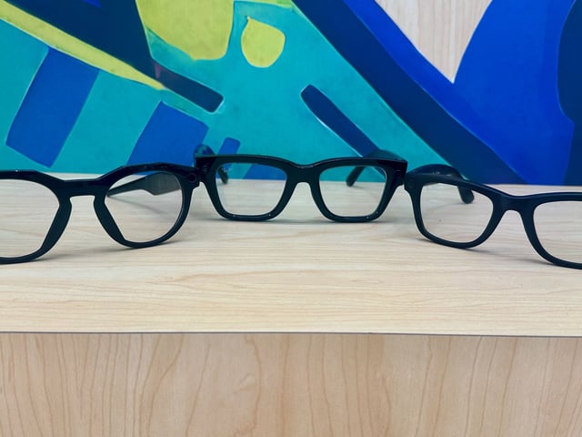 A photo of Oakley Meta HSTN (left), Meta Ray-Ban Display (center), and Ray-Ban Meta Gen 2 (right) smart glasses next to each other, showcasing their relative designs.