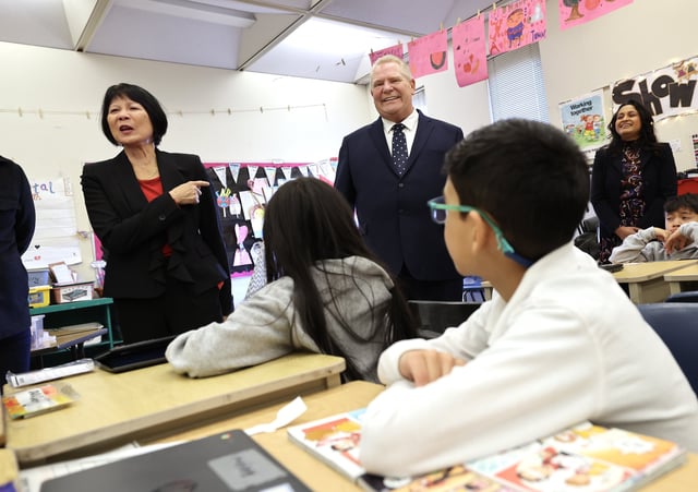 Toronto Mayor Olivia Chow, left, and Premier Doug Ford visit Albion Heights Junior Middle School to make an announcement about a school nutrition program in Toronto on March 21, 2025.