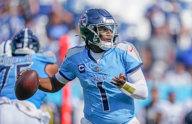 Sep 21, 2025; Nashville, Tennessee, USA; Tennessee Titans quarterback Cam Ward (1) looks for a receiver through the Indianapolis Colts defense during the fourth quarter  at Nissan Stadium. Mandatory Credit: Andrew Nelles-USA TODAY Network via Imagn Images/File photo