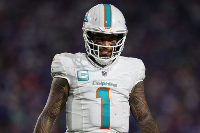 ORCHARD PARK, NEW YORK - SEPTEMBER 18: Tua Tagovailoa #1 of the Miami Dolphins looks on during the third quarter of the NFL 2025 game between Miami Dolphins and Buffalo Bills at Highmark Stadium on September 18, 2025 in Orchard Park, New York. (Photo by Bryan Bennett/Getty Images)