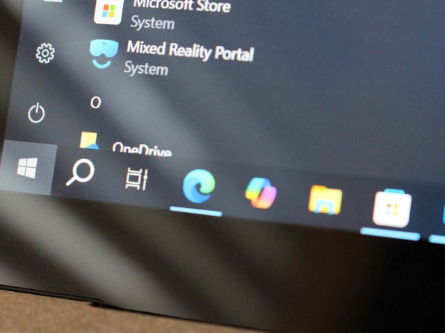 Windows 10 running on a laptop with desktop elements displayed on its screen