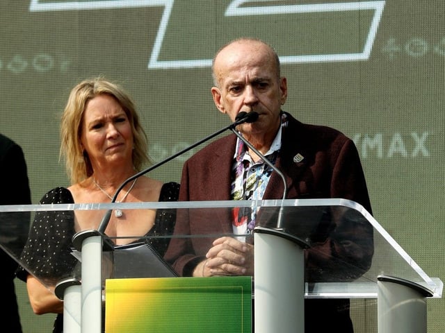 Deb Thompson and Larry Thompson speak to the media after being announced as the new owners of the Edmonton Elks Football Club, during a press conference on the field at Commonwealth Stadium, in Edmonton Thursday Aug. 15, 2024.