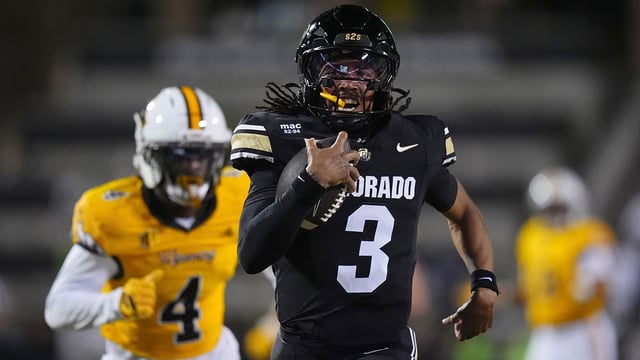 Colorado Buffaloes quarterback Kaidon Salter (3) carries the ball for a touchdown in the fourth quarter against the Wyoming Cowboys at Folsom Field. Mandatory Credit: Ron Chenoy-Imagn Images