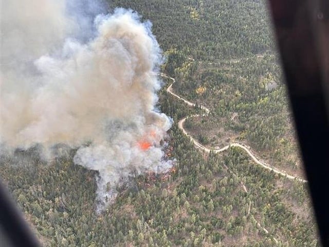  A fire burns at Munro Lake, near Peachland on Sept. 25, 2025.
