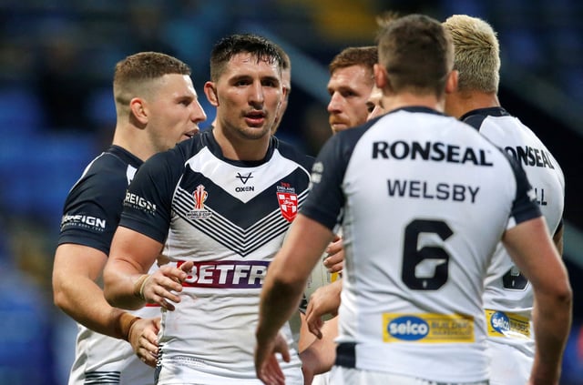 Rugby League - World Cup - England v France - University of Bolton Stadium, Bolton, Britain - October 22, 2022 England's Victor Radley celebrates scoring their fifth try with teammates  Action Images/Ed Sykes/File Photo
