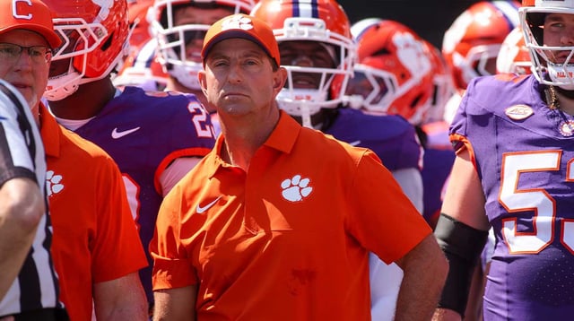 Sep 13, 2025; Atlanta, Georgia, USA; Clemson Tigers head coach Dabo Swinney prepares to run on the field with his team before a game against the Georgia Tech Yellow Jackets at Bobby Dodd Stadium at Hyundai Field. Mandatory Credit: Brett Davis-Imagn Images