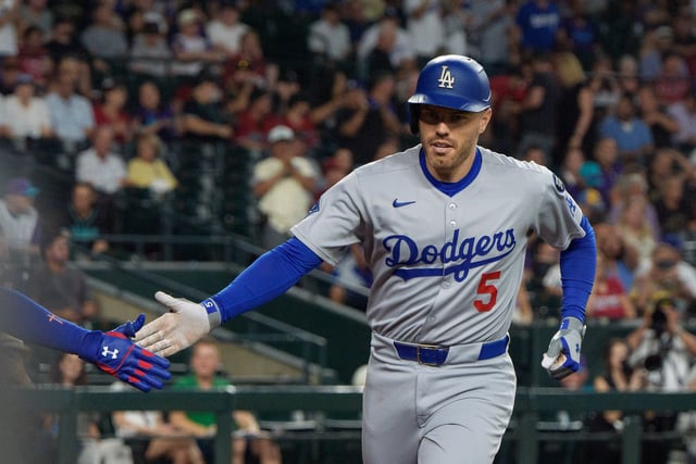 Sep 25, 2025; Phoenix, Arizona, USA; Los Angeles Dodgers infielder Freddie Freeman (5) celebrates after hitting a home run in the second inning against the Arizona Diamondbacks at Chase Field. Mandatory Credit: Allan Henry-Imagn Images