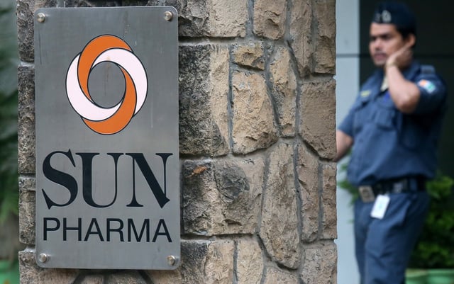 A guard walks inside the office of Sun Pharmaceutical Industries Ltd in Mumbai, India, November 13, 2018. REUTERS/Francis Mascarenhas/File Photo
