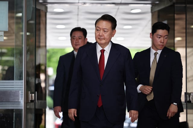 Former South Korean President Yoon Suk Yeol arrives at a court to attend a hearing to review his arrest warrant requested by special prosecutors in Seoul, South Korea, July 9, 2025. REUTERS/Kim Hong-Ji/Pool/File Photo