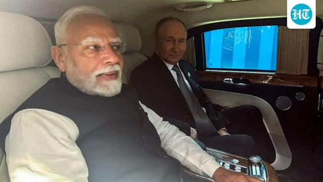 Prime Minister Narendra Modi and Russian President Vladimir Putin share a car together to the venue of their bilateral meeting, in Tianjin on Monday. 