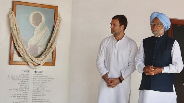 Congress President Rahul Gandhi and Former Prime Minister Manmohan Singh during a prayer meeting at Gandhi Ashram (Photo: IANS/AICC)