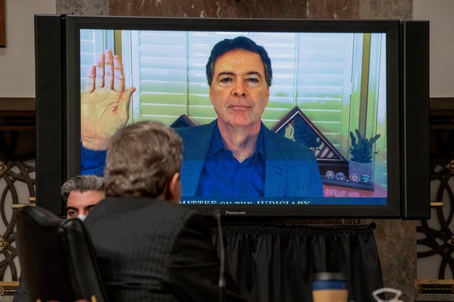 Former FBI director James Comey is sworn via video conference before testifying during a Senate Judiciary Committee hearing on Capitol Hill in Washington, Wednesday, Sept. 30, 2020, to examine the FBI “Crossfire Hurricane” investigation.