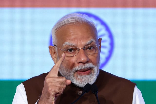 India's Prime Minister Narendra Modi delivers a speech at the India-Japan Economic Forum in Tokyo, Japan August 29, 2025.  REUTERS/Issei Kato/ File Photo
