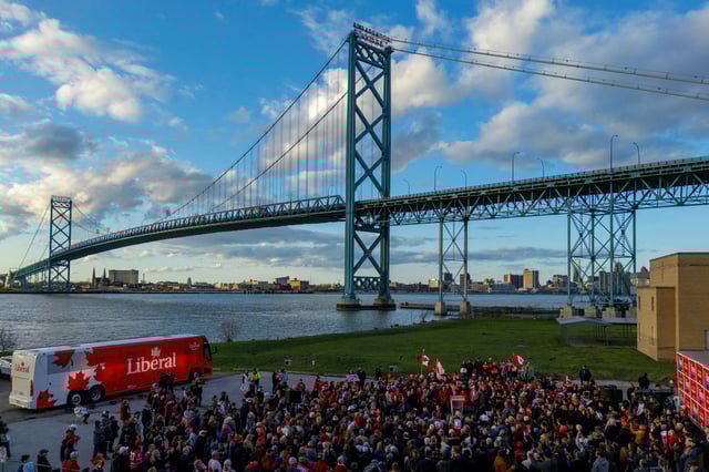 A drone view shows Canada's Prime Minister Mark Carney delivering a speech during a visit to the Ambassador Bridge linking Ontario with Michigan, U.S., as part of his Liberal Party election campaign tour, in Windsor, Ontario, Canada, April 26, 2025. REUTERS/Carlos Osorio/File Photo