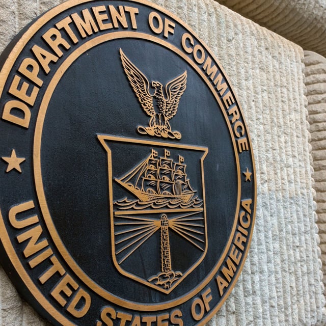 WASHINGTON, DC - JUNE 9: A U.S. Department of Commerce sign is displayed at the Herbert C. Hoover Federal Building on June 9, 2025 in Washington, DC. (Photo by Kevin Carter/Getty Images)