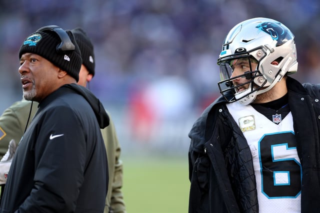 BALTIMORE, MARYLAND - NOVEMBER 20: Quarterback Baker Mayfield #6 of the Carolina Panthers talks with head coach Steve Wilks against the Baltimore Ravens at M&T Bank Stadium on November 20, 2022 in Baltimore, Maryland. (Photo by Rob Carr/Getty Images)