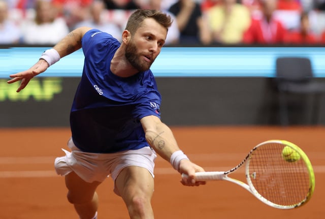 Tennis - Davis Cup - Qualifiers - Second Round - Croatia v France - Gradski vrt Hall, Osijek, Croatia - September 13, 2025 France's Corentin Moutet in action during his singles match against Croatia's Marin Cilic REUTERS/Antonio Bronic/File Photo
