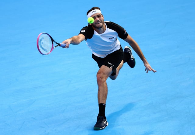 Tennis - ATP 500 - Japan Open Tennis Championships - Ariake Coliseum, Tokyo, Japan - September 26, 2025 Taylor Fritz of the U.S. in action during his round of 16 match against Portugal's Nuno Borges REUTERS/Issei Kato