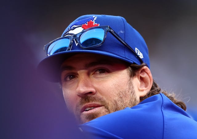 TORONTO, ON - AUGUST 27:  Kevin Gausman #34 of the Toronto Blue Jays looks on from the dugout during a game against the Minnesota Twins at Rogers Centre on August 27, 2025 in Toronto, Ontario, Canada.  (Photo by Vaughn Ridley/Getty Images)