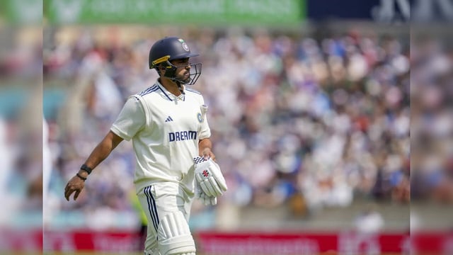 London: India's Karun Nair returns to pavilion after his dismissal by England's ...