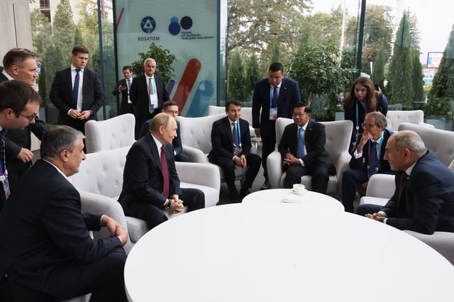 From left; Iranian Vice President and the head of the Atomic Energy Organization of Iran (AEOI) Mohammad Eslami, Russian President Vladimir Putin, Uzbek Deputy Prime Minister Zhamshid Khodzhayev, Myanmar's Military leader Senior Gen. Min Aung Hlaing, International Atomic Energy Agency (IAEA) Director General Rafael Grossi and Armenian Prime Minister Nikol Pashinyan speak ahead of a session at the World Atomic Week forum at the Exhibition of Achievements of National Economy (VDNKh) in Moscow, Thursday, Sept. 25, 2025. (Mikhail Metzel, Sputnik, Kremlin Pool Photo via AP)