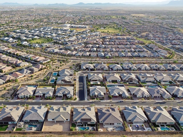 An aerial view of homes in the Phoenix suburbs on June 9, 2023 in Queen Creek, Arizona.